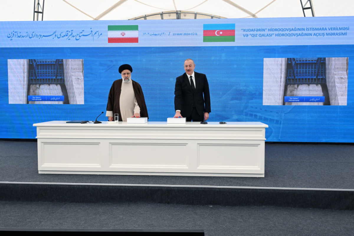 با حضور رؤسای جمهور آذربایجان و ایران، مراسم بهره برداری از تقاطع برق آبی «خداآفرین» و افتتاحیه تقاطع برق آبی «قیز قالاسی» برگزار شد - عکس 